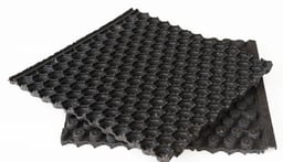 TwoTwo EnPlast 780 shock pad panels with raised pattern, designed for installation beneath synthetic turf athletic fields